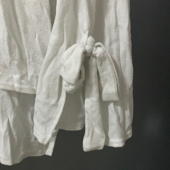 Lightweight knit top, with tie up bell sleeves. - Picture 2 of 3